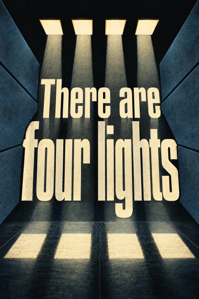 Four rectangular lights illuminate a dark blue chamber. Oversized cream lettering fills the space between angular inward walls and bright floor patches.
